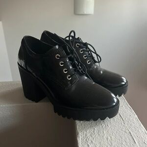 Sleek Black Platform Heeled Boots